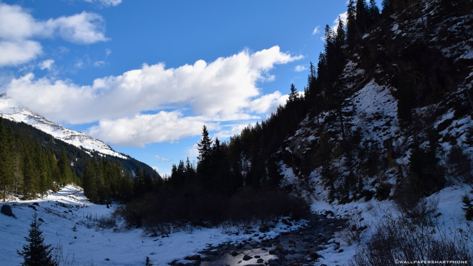 creek between mountains